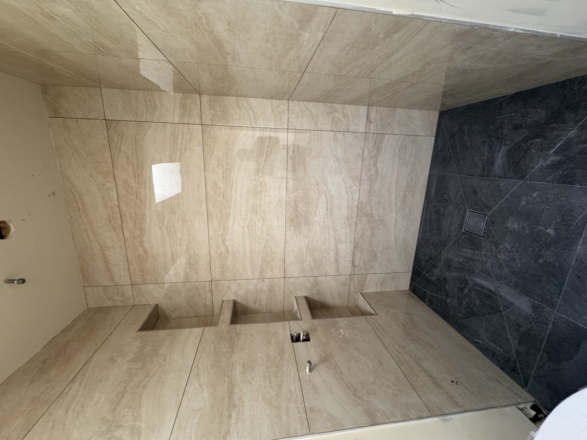 Premium tile shower installation - travertine and marble